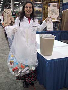 'Becca gathers recyclables from booths.