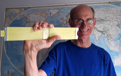 Rash holding his Pickett slide rule