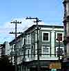 San Francisco street-scene: bay windows, and a web of overhead wiring
