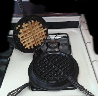 first waffle in reconditioned stove-top iron